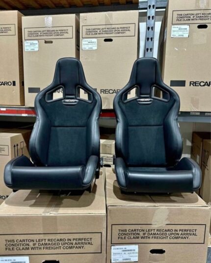 Front Recaro sportser CS in black vinyl bolsters seats with black suede inserts in  stock