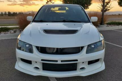 2006 Mitsubishi Lancer Evolution IX MR

5-Speed Manual, AWD, Dyno-Verified 627-hp, Extensive Modifications