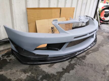 Evo 7/8/9 Varis 2 pattern front bumper with carbon canard, carbon lips and canard airducts